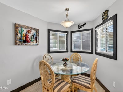 Inviting dining nook with natural light and updated finishes, perfect for casual meals and gatherings.