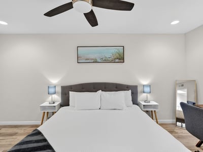 Open and inviting Scottsdale primary bedroom with updated finishes, generous space, and a calming neutral palette.