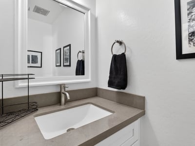 Contemporary Scottsdale bathroom vanity featuring sleek countertops, updated fixtures, and clean cabinetry for a polished, modern feel.