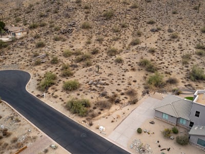 Quiet cul-de-sac homesite positioned against scenic desert mountains in Phoenix. This elevated lot offers privacy, natural beauty, and excellent potential for a luxury custom home retreat.