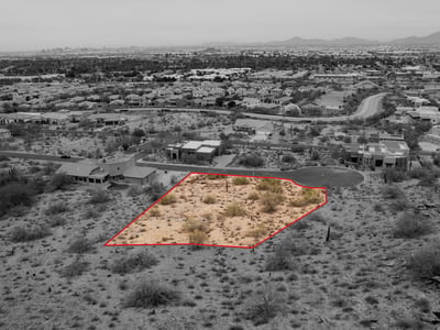 Scenic hillside homesite offering privacy, elevated views, and natural desert surroundings in Phoenix. Nearby luxury homes and mountain scenery create a truly exceptional build opportunity.