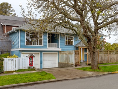 Inviting split-level home with a garage, spacious yard, and a welcoming atmosphere near local amenities.