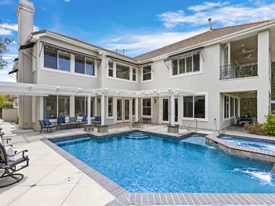 Expansive home with a stunning salt water pool, with newer pool heater and featuring tons of room to entertain
