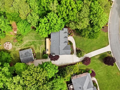 Nestled in lush greenery, this property features spacious outdoor areas and a thoughtfully designed layout.