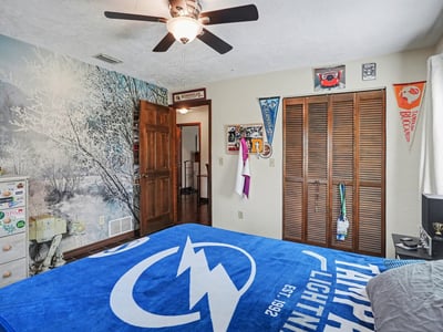 Another view of the second bedroom, looking out towards the hallway.