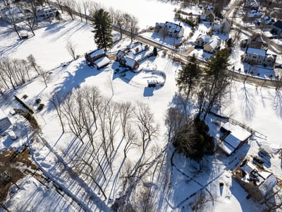 Discover a spacious, snow-covered lot perfect for building your dream home in a peaceful neighborhood.