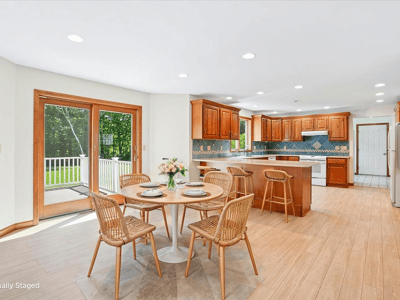 Bright and spacious kitchen featuring modern appliances, a large island, and abundant natural light.