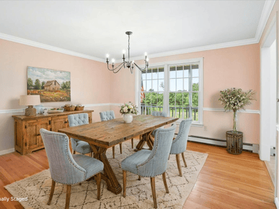 Formal Dining Area with gleaming Hardwood Flooring