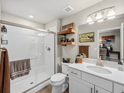 Jr Suite in basement with attached bathroom.