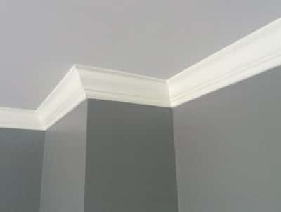 Showcasing modern crown molding in available townhomes, this photo highlights the clean lines and contemporary finish of the interior space.