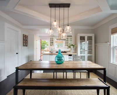 Open and spacious living and dining area. Original craftsman ceilings.