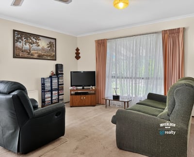 Bright and inviting living area featuring ample natural light and a welcoming atmosphere for relaxation.