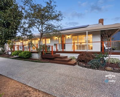 This inviting home features spacious outdoor areas and modern amenities, perfect for comfortable living and entertaining.