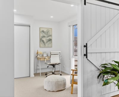 Bright and inviting workspace featuring modern furnishings and natural light, perfect for productivity and relaxation.