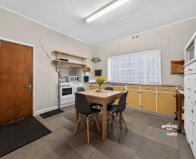 Bright and functional kitchen featuring ample storage, modern appliances, and a cozy dining area for gatherings.