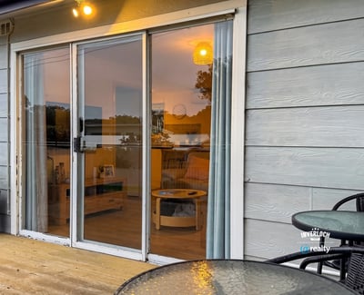 Bright and inviting space with large sliding doors, perfect for enjoying indoor-outdoor living.