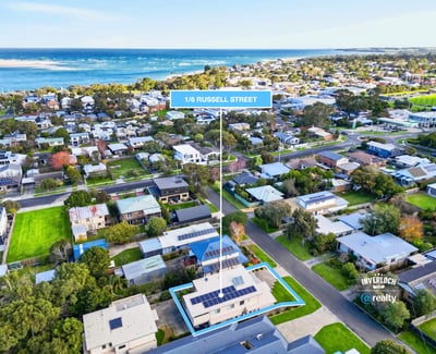 Discover this coastal property with modern features and ample outdoor space, perfect for beachside living.
