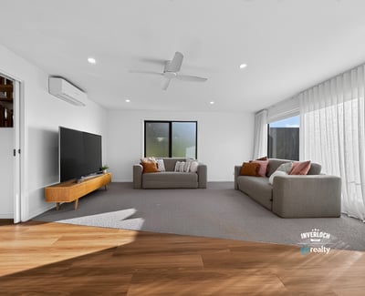Bright and spacious living area features modern finishes and abundant natural light, perfect for relaxation.