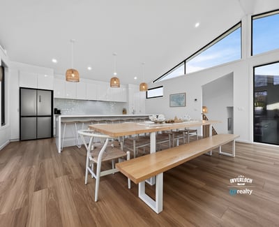 Spacious kitchen and dining area featuring modern appliances, ample natural light, and a generous layout.