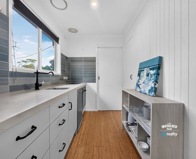 Bright kitchen featuring modern appliances and ample storage, perfect for culinary enthusiasts and everyday living.