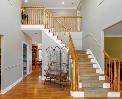 Welcoming and elegant two-story entrance foyer.