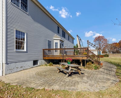 The large paver patio and deck provide lots of room for entertaining and outdoor recreation.