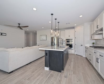 Enjoy a connected layout with chef-worthy kitchen features and a cozy breakfast nook, all within view of the private backyard and bright dining space.