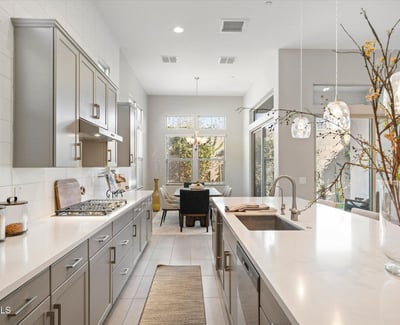 Sleek and functional kitchen offering generous counter space, modern appliances, and refined finishes that elevate daily living in Cave Creek.