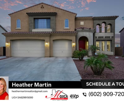 This impressive two-story home features arched windows, tile roofing, and a bold front entry. The spacious driveway and low-care yard highlight the thoughtful design of this Glendale property.