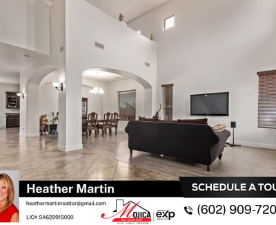 The spacious living room features abundant natural light, modern flooring updates, and a fluid layout that connects to the dining space. This Glendale home offers comfort and style throughout.