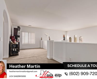 The open loft provides additional living space ideal for work, entertainment, or play. Overlooking the main floor, it enhances the spacious design of this Glendale home with private backyard pool.