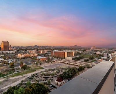 Spacious rooftop deck with unobstructed views of the city and mountains, enhancing the appeal of this Phoenix residence.