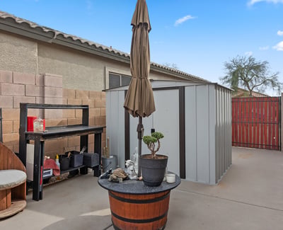 RV gate with dedicated concrete slab, providing secure parking and added versatility for vehicles or storage in Phoenix.