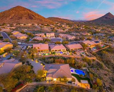Scottsdale aerial capturing the hillside location, private pool, and landscaped backyard with surrounding desert terrain.