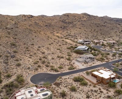 Sweeping aerial views capture the beauty of the Phoenix valley from this elevated desert homesite. Surrounded by mountain scenery and luxury properties, this lot offers exceptional custom build possibilities.