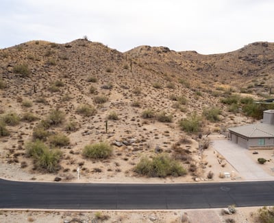 Elevated desert homesite with nearby hiking trail access and scenic mountain views. This Phoenix property combines natural desert beauty, privacy, and luxury custom home potential in a highly desirable hillside location.