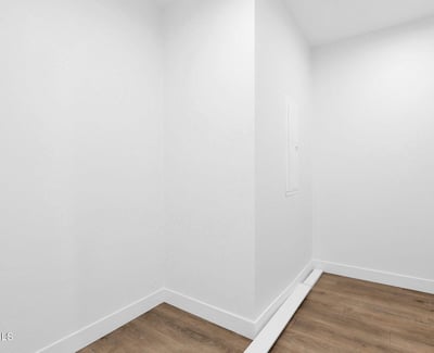 Dedicated laundry and storage space designed for efficiency and organization. The clean finishes and durable flooring provide a functional area that supports everyday household tasks with ease.