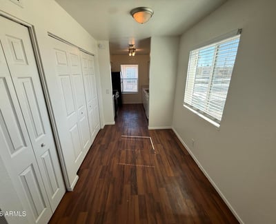 Bright dining space accented by large windows and attractive flooring. Conveniently positioned between the living area and kitchen, it creates an ideal flow for daily living and entertaining.