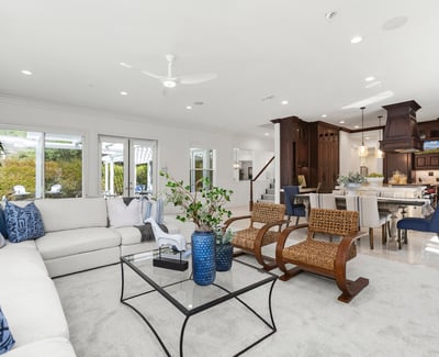 Bright, open-concept living space featuring modern furnishings, large windows, and seamless indoor-outdoor connectivity.