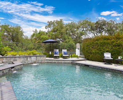 Discover your private oasis with a luxurious pool and tranquil landscaping, perfect for relaxation and entertaining.