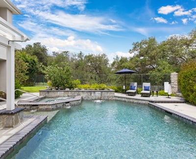 Discover your oasis with a spacious pool and scenic backyard, perfect for relaxation and outdoor entertaining.