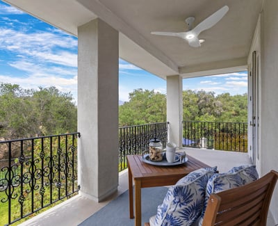 Primary Bedroom Private and Spacious balcony with scenic views, perfect for outdoor relaxation and enjoying nature's beauty.