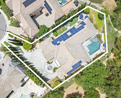 Spacious property featuring a solar-equipped home, pool, and landscaped outdoor areas in a private location.