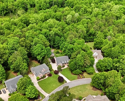 Discover this spacious neighborhood surrounded by lush greenery, offering both privacy and community connectivity.