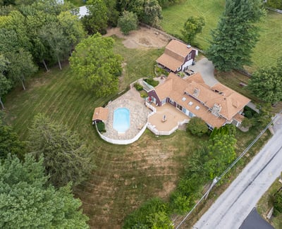 Spacious property featuring a pool and ample outdoor space, ideal for relaxation and entertaining.