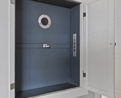 Discover a unique built-in safe, perfect for securing valuables in a convenient location.