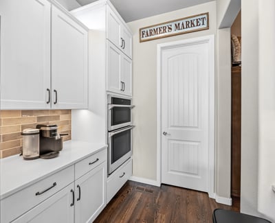 Coffee Bar in Kitchen that leads to pantry.