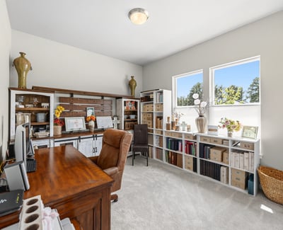 Main level bedroom used as a craft room