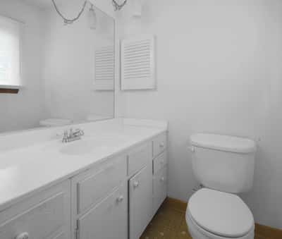 Primary bedroom private half bath