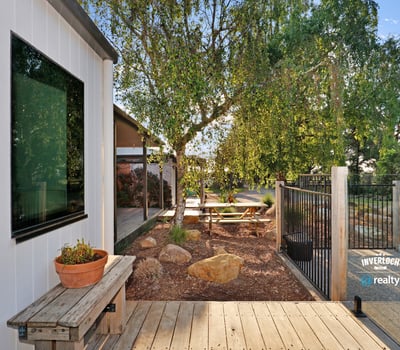 Modern outdoor space featuring a tranquil garden area, perfect for relaxation and entertaining.